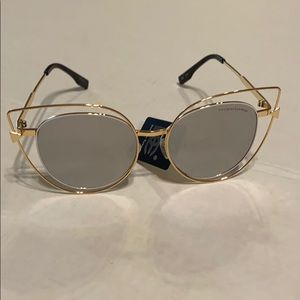 White and gold cat eye sunglasses